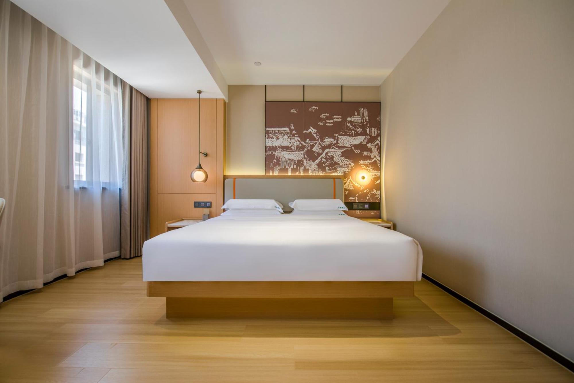 Yiwu Baide Theme Hotel Exterior foto