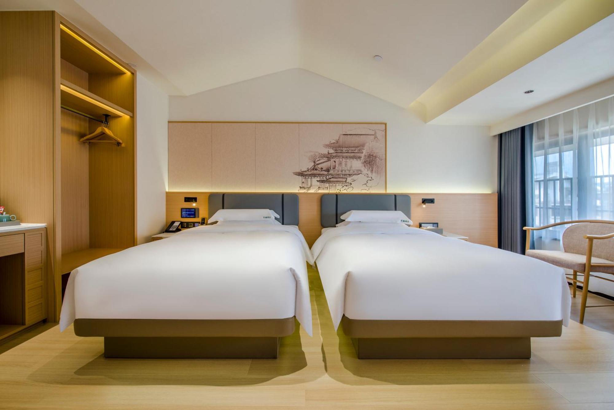 Yiwu Baide Theme Hotel Exterior foto