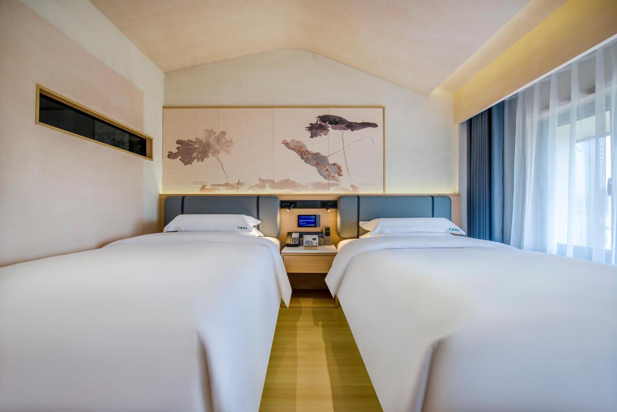 Yiwu Baide Theme Hotel Exterior foto